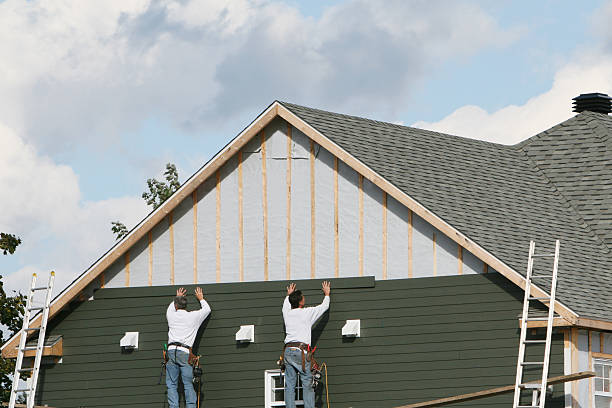 Professional Siding Contractor technician working in Warrington, PA
